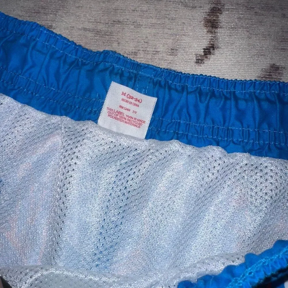 Celebrate patriotic peace swim trunks